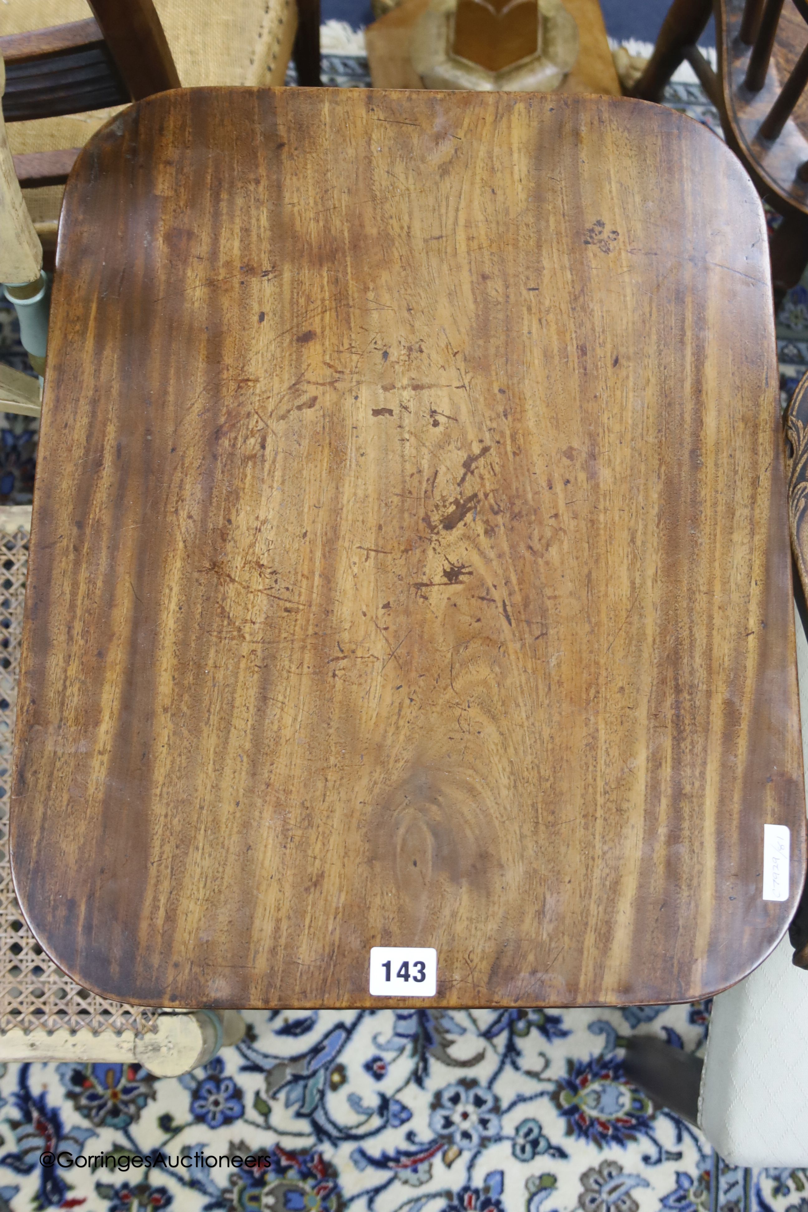 An early 19th century mahogany occasional table with rectangular tilt top, width 50cm depth 39cm height 69cm